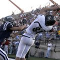 Bentonville senior Austin Molitor catches a touchdown in front of Bartlesville (Okla.) junior Jeyton...