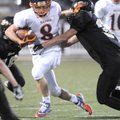 Heritage freshman Brandon Gates sheds a Bentonville Black defender during Thursday’s game in Tiger S...