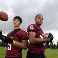 Springdale High receivers Henry Hernandez, left, and Kempys Robinson are two of the Red Bulldogs’ go...