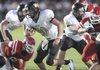 West Fork senior running back Logan Genz (20) carries the ball into the end zone through the Farmington defense during the second quarter Friday at Allen Holland Field in Farmington.