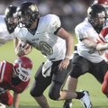 West Fork senior running back Logan Genz (20) carries the ball into the end zone through the Farming...