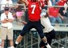 Arkansas Baptist’s Ryan Perkins (7) jumps to catch a pass in front of Bigelow’s Damien Choat during Friday’s game at Eagle Field in Little Rock. Arkansas Baptist shut out Bigelow 35-0.