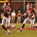Arkansas running back Dennis Johnson finds a hole in the Tennessee Tech defense during a Sept. 5 gam...