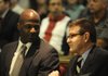 Ricky Ray Anderson talks Monday with his attorney, Ray Niblock. Anderson faces the death penalty if convicted of murdering Jill Lynn Ulmer.