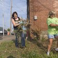 Brenda Rouse, right, works with other volunteers, Anita Davis, center, and Rick Culver on Monday to ...