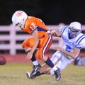Southwest Junior High’s Logan Carmean (17) loses the handle on a pass as Rogers freshman defensive b...