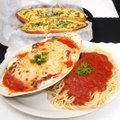 Palermo Villa II serves homemade Italian food like this Eggplant Rollitini, offered with spaghetti a...