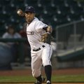 Northwest Arkansas third baseman Anthony Seratelli throws toward to first base during Game 2 of the ...
