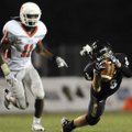 Bentonville wide receiver Drew Edwards makes a diving catch for 21 yards during the Tigers’ third-qu...
