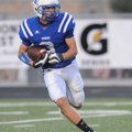 Rogers High’s Mason Young returns a kickoff Friday against Harrisonville, Mo., at Rogers.
