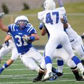 Rogers High’s Bronson Carpenter cuts to the outside Friday against Harrisonville, Mo., in Mountie St...