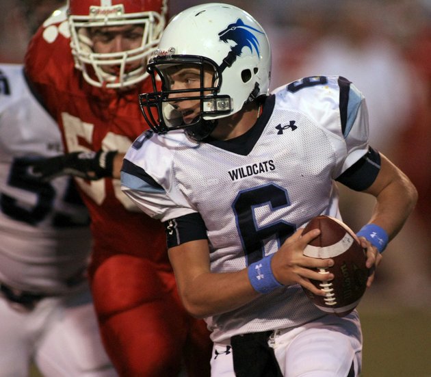 springdale-har-bers-ryan-luther-runs-the-ball-as-cabots-jared-dumais-gives-chase-during-their-game-friday-night-in-cabot