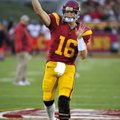 Southern California quarterback Mitch Mustain warms up his arm before the Trojans play Virginia in t...