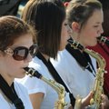 Sara Jo Archer, left, plays the alto saxophone Saturday with the Heritage High School Jazz Band duri...