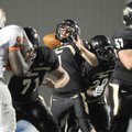 Bentonville quarterback Dallas Hardison drops back to pass during the Tigers’ game Friday against Te...