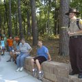 Park Interpreter Rachel Dierson leads a hike Saturday at Hobbs State Park-Conservation Area near Rog...