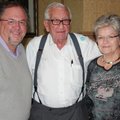 Jones Center supporters John Ervin, from left, and Gene and Virginia George visit after the organiza...