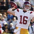 Southern California quarterback Mitch Mustain warms up his arm before a game during his junior seaso...