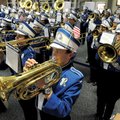 HONOR BAND - Andrew Simpson plays his baritone with the Rogers High School marching band at the Nort...