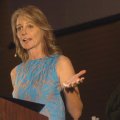 Actress Helen Hunt addresses the conference Tuesday afternoon.