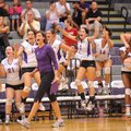 Fayetteville coach Jessica Phelan and her players celebrate a point against Fort Smith Southside dur...