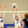 Rogers High junior Mikalah Booher, left, and senior Sierra VanAllen block a shot by Springdale Har-B...