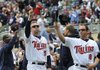 Michael Cuddyer and Nick Punto are among several Minnesota players making a curtain call prior to Wednesday’s 5-1 victory over Cleveland. 
