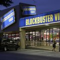 FILE - This July 23, 2006 file photo shows customers enter a Blockbuster video store in Dallas. The ...