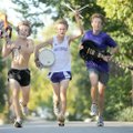 Fayetteville High junior cross country team members, from left, Matt Hawkins, Byron Eagle McClendon ...