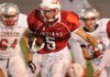 Fayetteville Ramay running back Aaron Kildow carries the ball against Springdale George on Sept. 9.