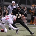 Bentonville Black’s Luciano Cozzani tries to dodge a Springdale George defender Thursday in Tiger St...