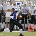 Fayetteville Woodland wide receiver Kyle Pate runs the ball upfield against Rogers High in the first...