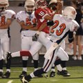 Springdale Southwest’s Guss Vitt finds a hole in the Fayetteville Ramay defense for a 60-yard touchd...