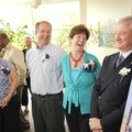 Outgoing members of the Fayetteville Board of Education Howard Hamilton, right, and Tim Kring, share...