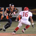 Rogers Heritage Zac Stewart carries the ball on Friday against Fort Smith Northside in Gates Stadium...