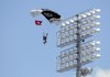 A member of the U.S. Army’s Silver Wings Parachute Team jumps into Razorback Stadium on Friday as a practice for a jump before the game today against Alabama. The visit is sponsored by the univeristy’s Reserve Officer Training Corps.
