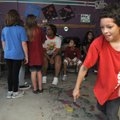 KIDS IN PLAY - Blain Whitfield, 10, of Rogers dances Friday at the Boys & Girls Club of Benton Count...