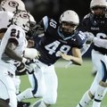 Springdale Har-Ber’s Evan Nuessner, center, moves in to make the tackle on Springdale High’s Rahmon ...