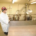 Jesse Pierce, Ozark Mountain Smokehouse co-owner, gives a tour of the jelly preparation room at the ...