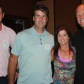 Charity Challenge of Champions executive board member Kim Ellis talks with tennis pros Scott Colebou...