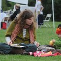  Betony Maringer, left, and Penelope Maringer, 2, both of West Fork, eat lunch Sunday in Fayettevill...