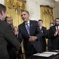 President Barack Obama shakes hands in the East Room of the White House in Washington, Monday, Sept....