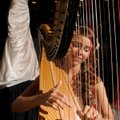  Music Arts Productions harpist Rebekah Grace creates a mood Sunday for showing bridal gowns from A ...