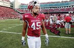 Arkansas tight end D.J. Williams walks off the field after Saturday’s 24-20 loss to No. 1 Alabama in Fayetteville. Razorbacks Coach Bobby Petrino hopes the loss will let his team find out what its really made of as the Hogs prepare for Texas A&M.