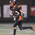 Rogers Heritage’s Sam Mayhall returns a kickoff Friday against Fort Smith Northside in Gates Stadium...