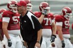 Arkansas strength and conditioning coach Jason Veltkamp (above), shown during practice last month, was part of a freshman class of 30 players and among only five or six to finish as seniors while playing for Bob Petrino, Sr. at Carroll College in Montana.