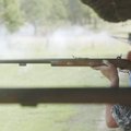 Korkey Conway of Monett, Mo., fires his muzzle-loader rifle at the Saunders Memorial Muzzle-Loader M...
