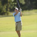 Springdale Har-Ber junior Zach Coats watches his second shot sail to the No. 9 green during the Wild...