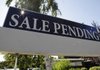 In this Sept. 30, 2010 photo, a "sale pending" sign is shown at a home in Palo Alto, Calif. The number of Americans who signed contracts to buy homes rose in August for the second straight month but remained far below last year's pace. 