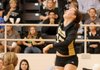 Bentonville’s Rebecca Brown drives a shot past Rogers High on Oct. 5 in Tiger Arena in Bentonville.